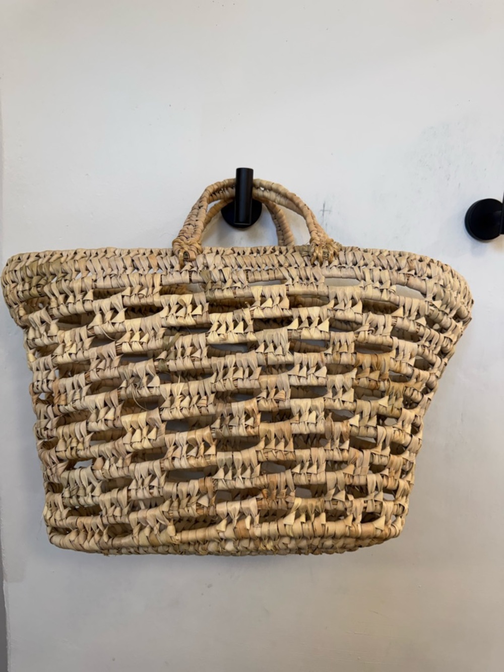 Handwoven straw basket tote